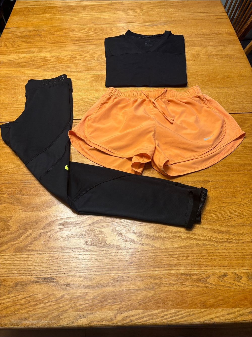Nike Orange Women’s Athletic Shorts with Black Leggings and Top - Picture 4 of 12